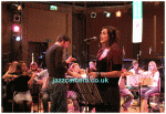 Jules Buckley, conductor, Lizzy Parks, singer, with the Heritage Orchestra